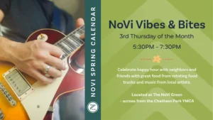 Promotional graphic for "NoVi Vibes & Bites," part of the NoVi Spring Calendar, held the 3rd Thursday of the month from 5:30PM to 7:30PM. The left side features a close-up photograph of a person playing an electric guitar, with hands in focus on the fretboard and body of a sunburst-finished Les Paul-style guitar. One hand presses chords on the neck while the other rests near the pickups, with two silver rings visible on the fingers. The player wears a dark blue-gray shirt, blurred in the background. A dark teal vertical band separates the image from the right side, which has a light green chevron-patterned background with dark navy and white text inviting neighbors and friends to celebrate happy hour with rotating food trucks and music from local artists, with the location noted as The NoVi Green across from the Chatham Park YMCA. A small orange flower icon and a circular logo with stylized lettering appear as accents.