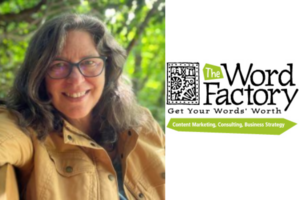 A smiling woman with long gray-streaked hair and glasses wearing a tan jacket, photographed outdoors against green foliage, alongside the logo for The Word Factory — a content marketing, consulting, and business strategy company with the tagline "Get Your Words' Worth."