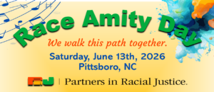Event banner with a soft yellow background. The title "Race Amity Day" arcs across the top in bold green lettering, with a flourish of blue musical notes flowing from the upper left and a splash of multicolored watercolor (blues, oranges, teals) in the upper right. Below the title, in orange italic script: "We walk this path together." Event details in blue: Saturday, June 13th, 2026, Pittsboro, NC. The Partners in Racial Justice logo (orange and green "PRJ" mark) appears at the bottom alongside the organization name.
